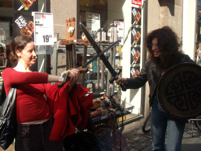 may-18-25-2008-copenhagen-with-debra-and-cousins-katie-and-me-duelling-outside-a-cool-store-in-cph.jpg