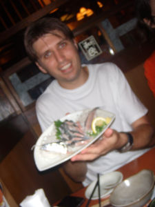 Japan (Aug 25- Sept 10 09) - Jason and his fish meal at the izakaya